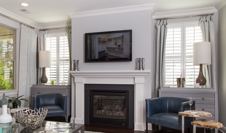 Denver mantle with white shutters.